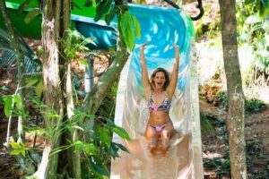 Admission + 2x Zip Line + Unlimited Water Slide Rides - What you’re really buying: admission plus unlimited slide time and zip line thrills
