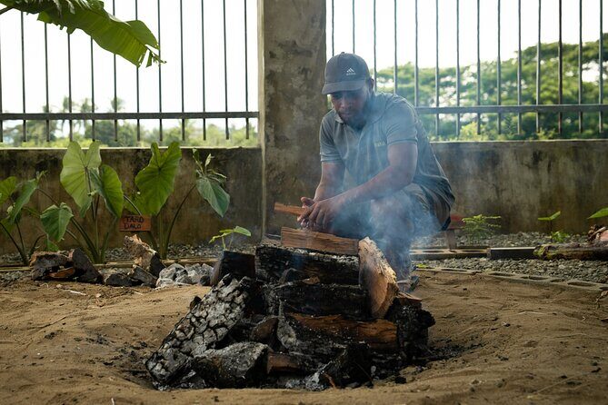 Vavavi - Fijian Cooking & Cultural Experience - Lovo earth oven setup: the slow-cook method that makes the food